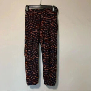 The Upside navy orange tiger leggings